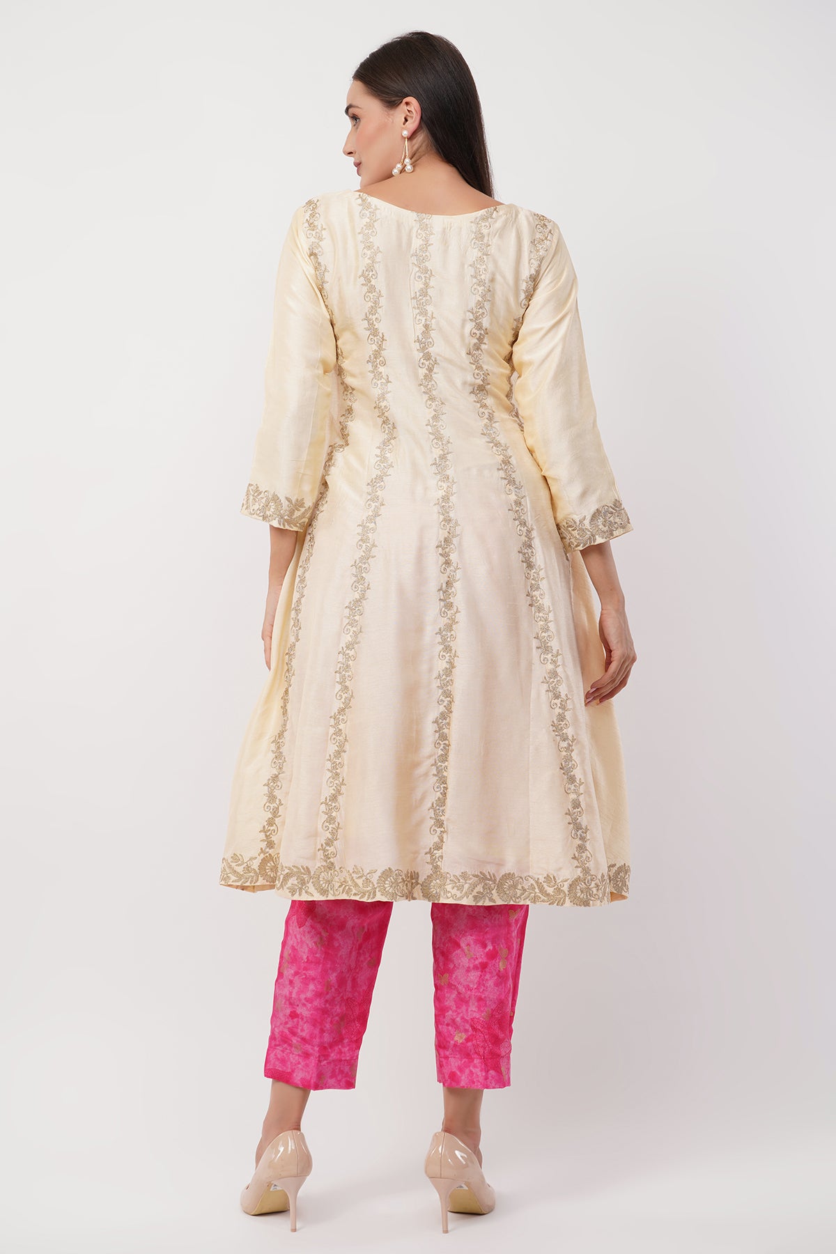 Suique Opulent Cream Anarkali with Golden Embroidery and Vibrant Pink Pants