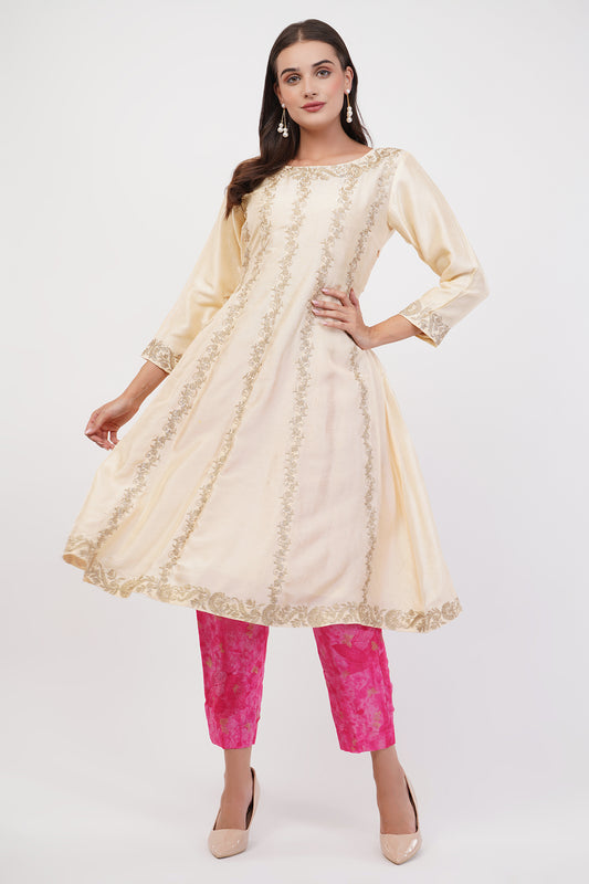 Suique Opulent Cream Anarkali with Golden Embroidery and Vibrant Pink Pants